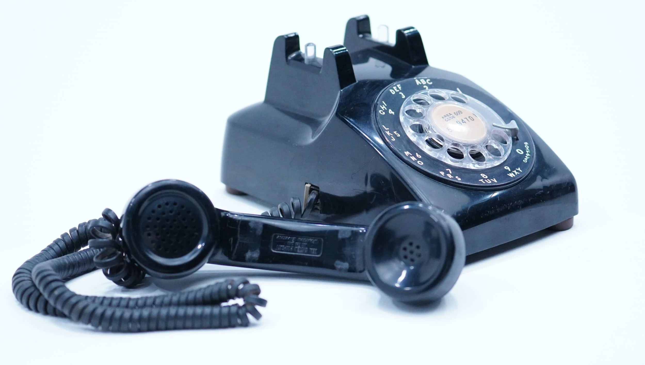 Black rotary telephone