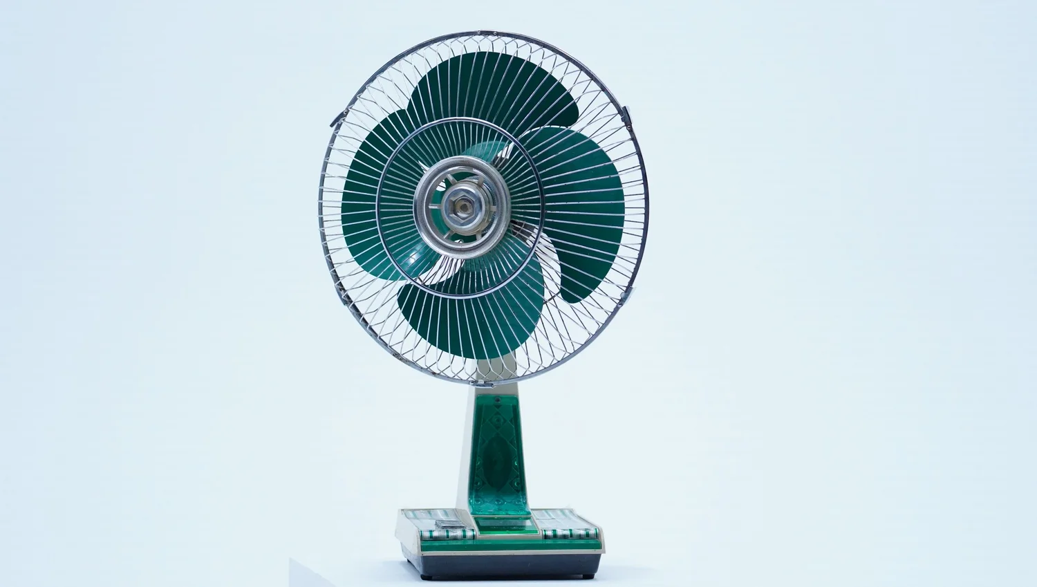 Green vintage desk fan